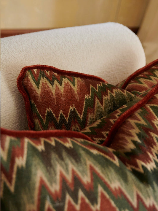 Orange herringbone cushion with velvet cord – view 2