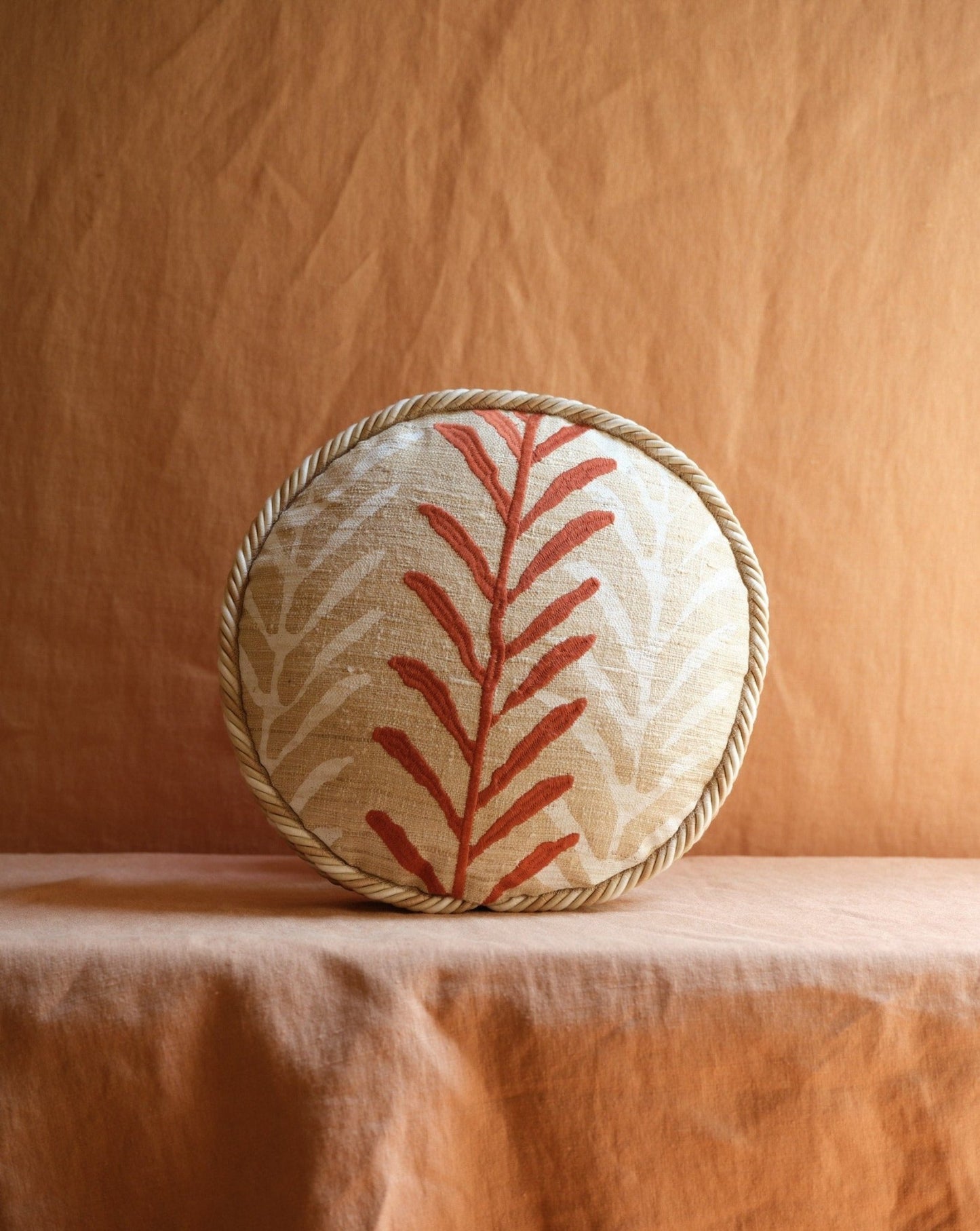 ROUND PILLOW WITH PIPING CORD - House of Quintana