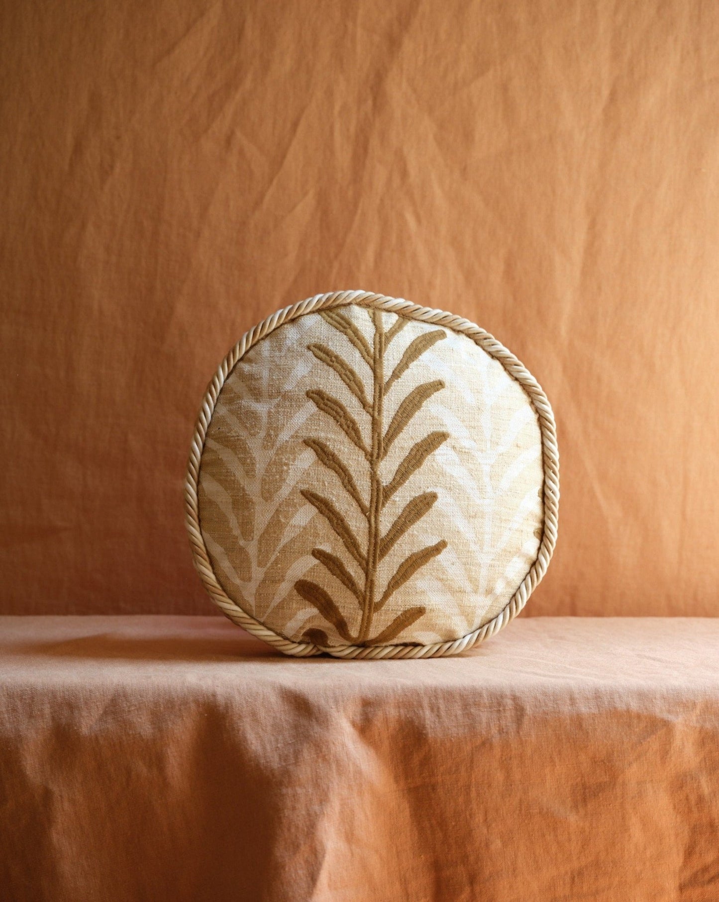 ROUND PILLOW WITH PIPING CORD - House of Quintana